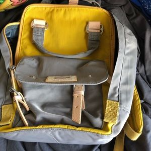 yellow and grey backpack